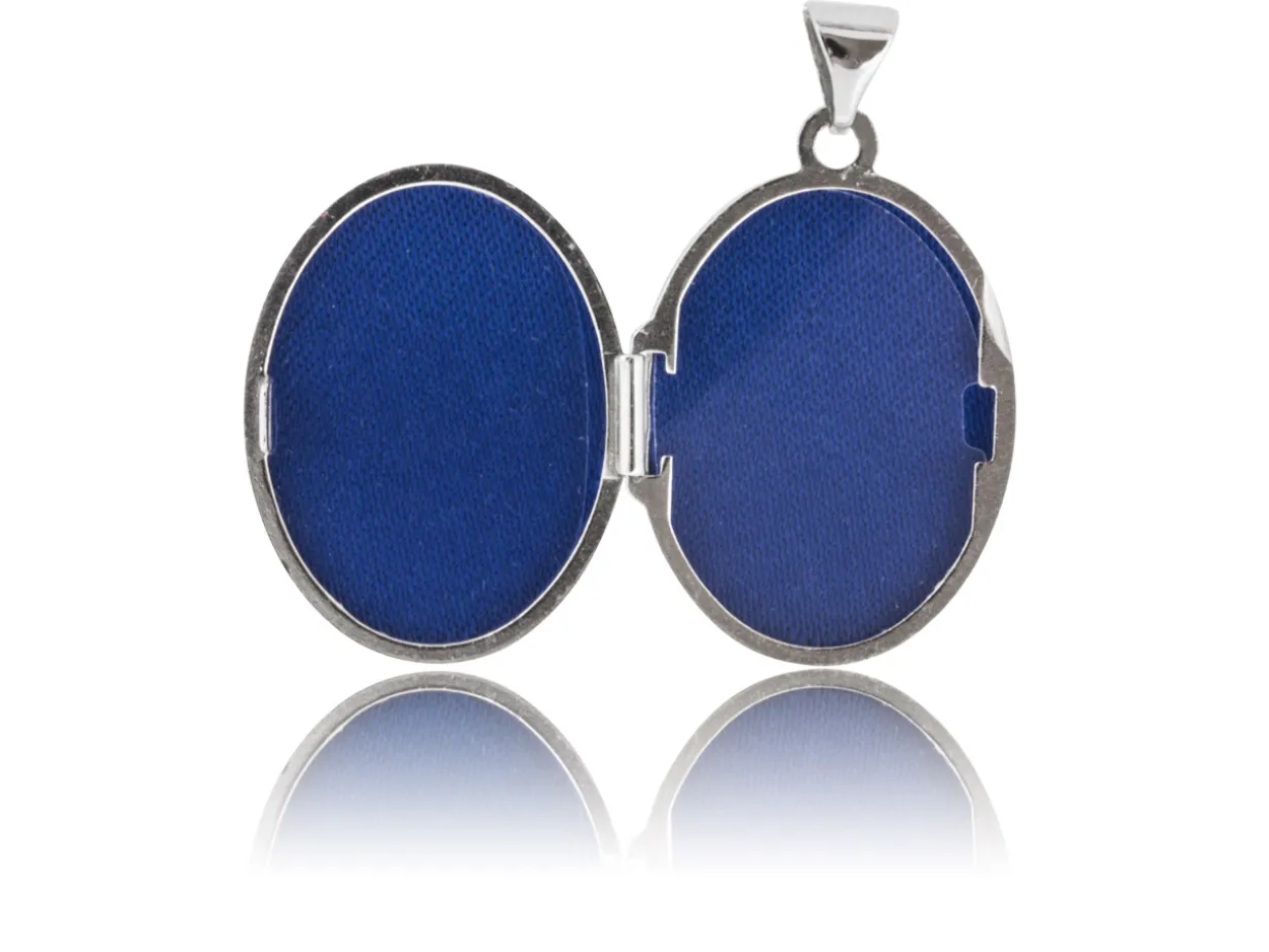 Sterling Silver Locket 21mm Filigree Oval Set With 0.005ct Diamond